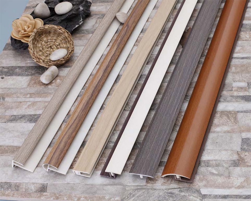 Tira de transici&oacute;n de piso de UPVC de grano de madera