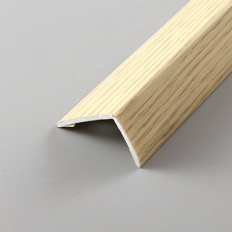 Tiras de bordes de esquina de piso de madera maciza de PVC en forma de L de 32 * 28 mm