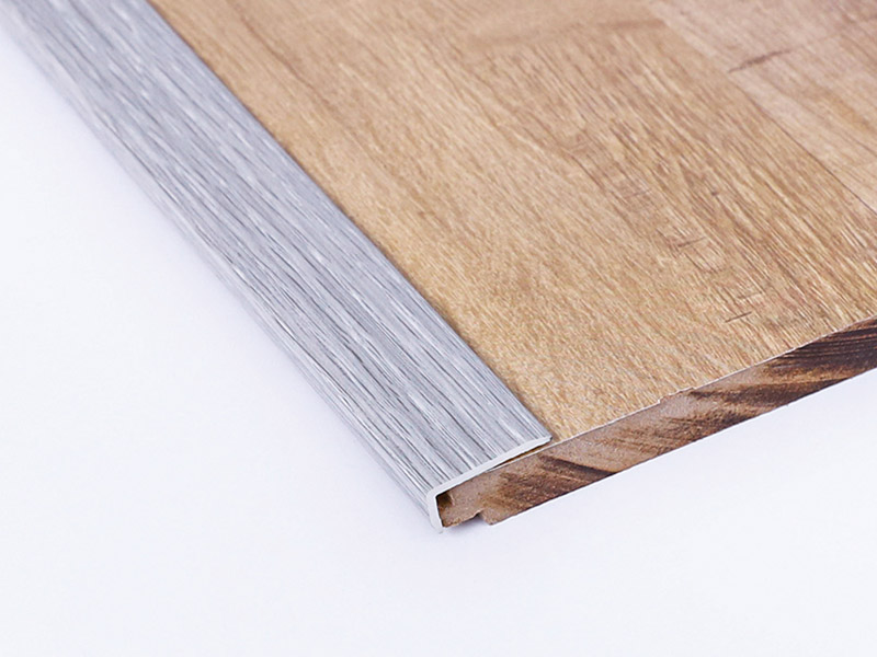 Listones para bordes de suelo de madera en forma de L