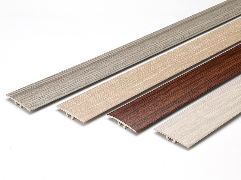 Tira de umbral de puerta con efecto de madera SPC de 42 * 6,6 mm