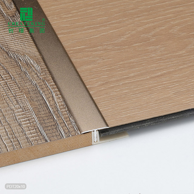 Tira de transición de piso con moldura en T de aluminio de 10,9x20 mm